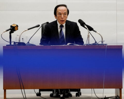 BOJ keeps rates steady but hawkish split points to June hike