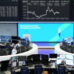 European shares edge lower as US-Iran talks stall; corporate earnings on tap