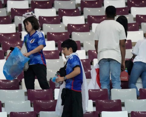 Why you may see Japanese soccer fans cleaning up the stadium after World Cup games