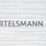 Bertelsmann merges firms behind Kylie Minogue, Miles Davis to create world's No.4 music group