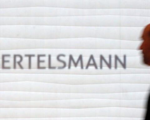 Bertelsmann merges firms behind Kylie Minogue, Miles Davis to create world's No.4 music group