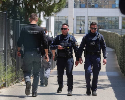 Five wounded in two shootings in Athens, 89-year-old gunman at large