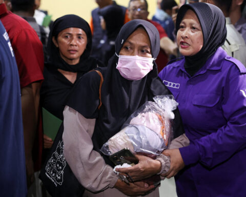 Indonesia commuter train crash toll rises to 15 as rescuers complete evacuation