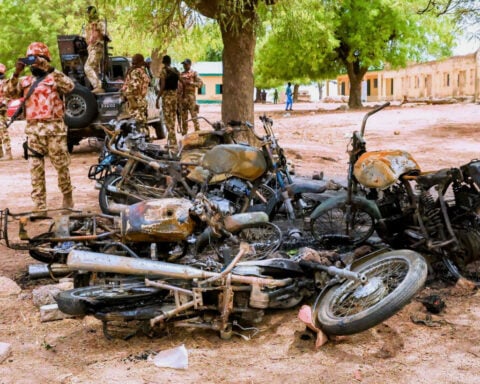 Islamic State militants kill at least 29 in an attack on a village in northeastern Nigeria