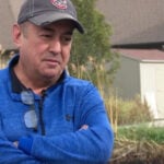 Resident recounts damage to home after juvenile allegedly starts fire in nearby grass