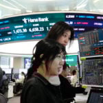 Asian stocks gain and oil prices decline after the UAE says it will exit OPEC