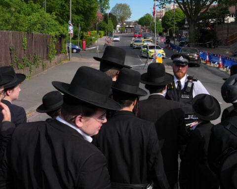London police say the stabbing of 2 Jewish men is an act of terror. The suspect was arrested