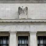 Fed holds rates steady amid sharp divide over policy easing bias