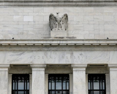 Fed holds rates steady amid sharp divide over policy easing bias