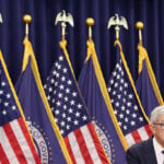 Powell says decision to stay on at Fed for a time reflects his concern over legal attacks