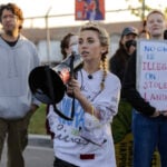 US to drop felony charge against ex-congressional candidate, three others over Chicago immigration protest