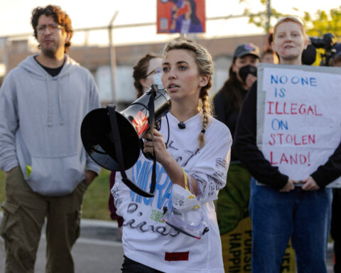 US to drop felony charge against ex-congressional candidate, three others over Chicago immigration protest