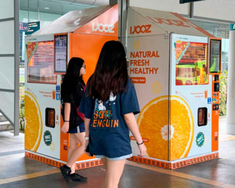 French teen charged in Singapore over a vending machine straw-licking video