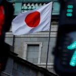 BOJ warns inflation could rise well above target in risk scenario