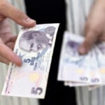 EM stocks, FX fall on renewed Iran war risks, but set for monthly gains