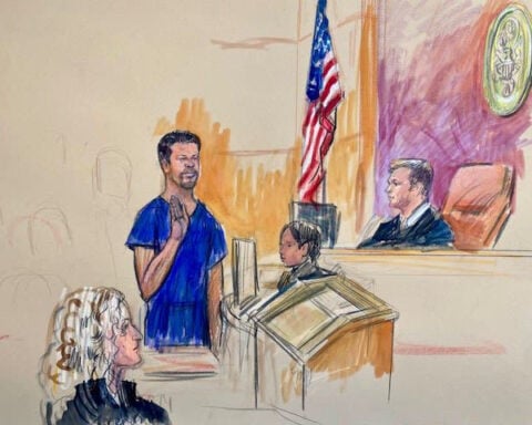 Lawyers for suspected gunman at press dinner agree to keeping him in jail before trial
