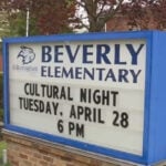 Stickers showing assault rifles and political slurs found at Beverly Elementary School event