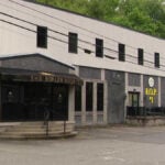 Residents rally against plan to house federal inmates in neighborhood