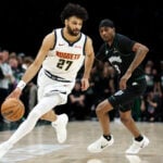 Jaden McDaniels leads the T-wolves on both ends of the court in 110-98 clincher to oust Nuggets in 6