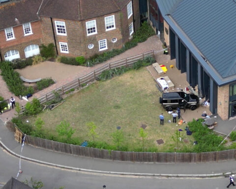 Woman who drove into a tea party outside a London school charged over death of 2 girls