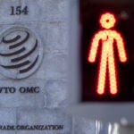WTO plans 10% budget cut as US falls back into arrears, documents show