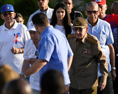Cuba's Raul Castro joins May Day march as tensions simmer with US