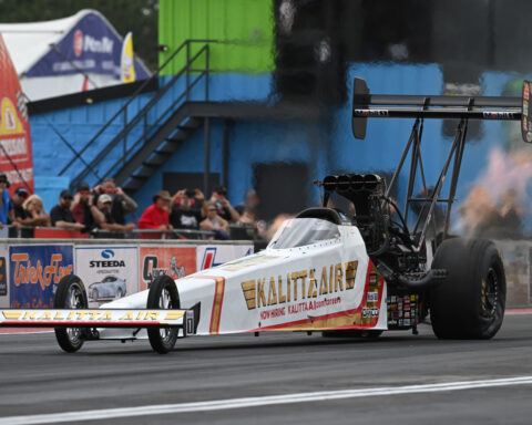 Shawn Langdon breaks the NHRA speed record by reaching 345 mph in his Top Fuel dragster