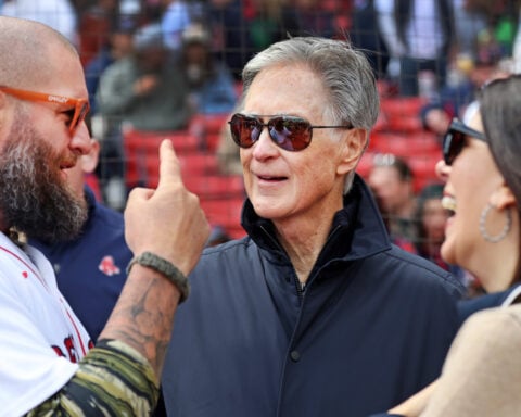 Plane circles Fenway Park for an hour towing banner imploring Red Sox ownership to sell the team