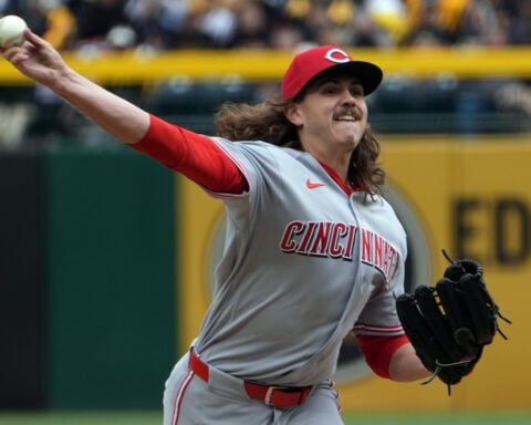 The Reds tie an MLB record by walking 7 straight batters in a 17-7 loss to the Pirates