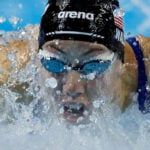 Swimming-American Walsh improves own 100m butterfly world record for third time in a year