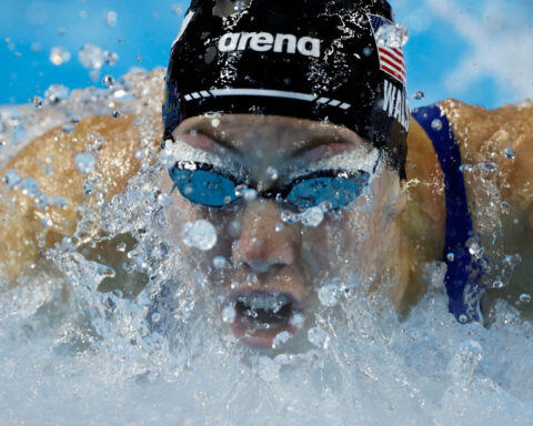 Swimming-American Walsh improves own 100m butterfly world record for third time in a year