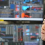 Asian markets are mixed and oil is steady after Wall Street hits records