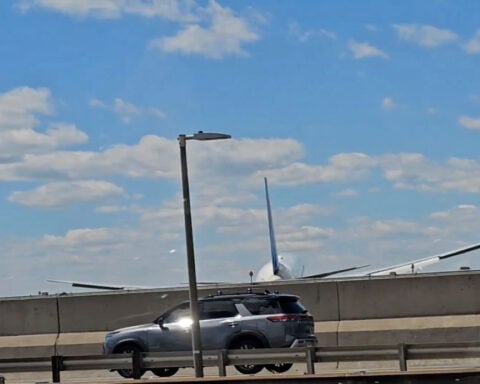United flight collides with truck and light pole as it lands at Newark airport
