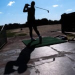 Judge in dispute over Washington golf course tells Trump officials not to cut trees without notice