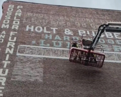Faded "ghost signs" of Boston's past now being restored on West End buildings