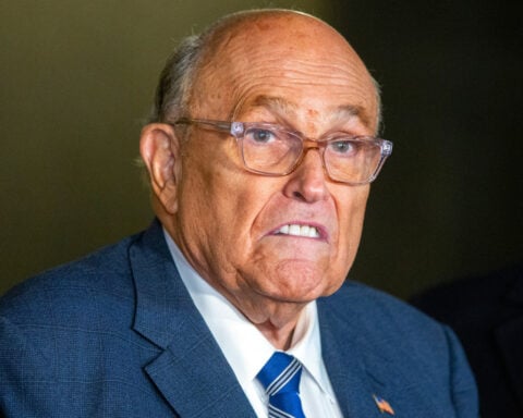 Rudy Giuliani is breathing on his own while hospitalized with pneumonia, spokesperson says