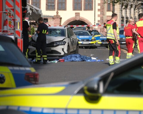 Two dead after car strikes crowd in German city, police say