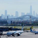 A United jet narrowly avoided catastrophe when it struck a truck near Newark airport during landing