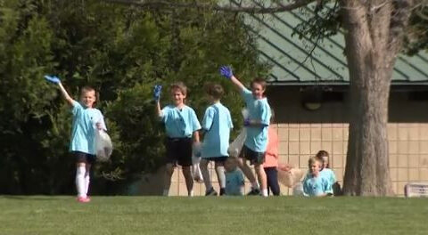 Boys start park cleaning club to 'help the world'
