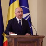 Romania's pro-EU minority government on the ropes as parliament debates no-confidence motion