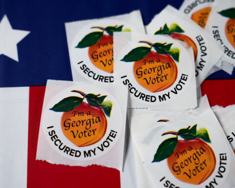 Justice Department seeks the names of 2020 election workers in Georgia's Fulton County
