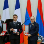 Macron croons classic ballads at a state dinner in Armenia for the French leader