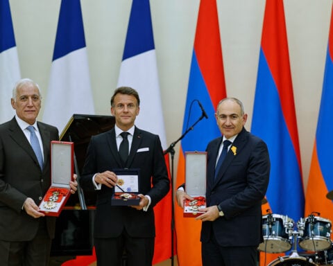 Macron croons classic ballads at a state dinner in Armenia for the French leader
