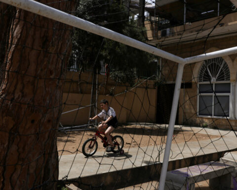 Beirut school converted to wartime shelter becomes flashpoint for societal tensions