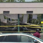 Bank drive-thru collapses on multiple vehicles, one person taken to hospital