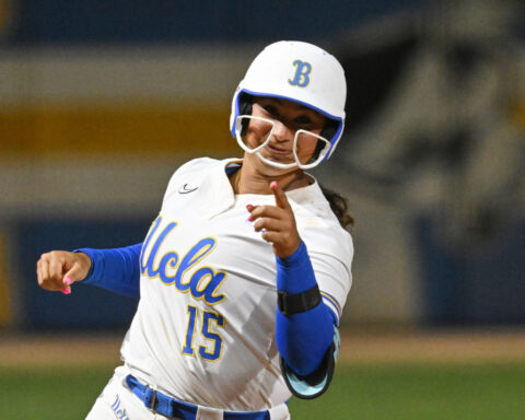 In a battle like McGwire and Sosa's '98 home run chase, Oklahoma, UCLA softball sluggers near record