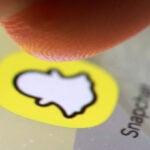Snap's quarterly revenue rises, daily active users return to growth