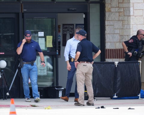 Man accused in Dallas-area shootings that killed 2 and injured 3 charged with capital murder