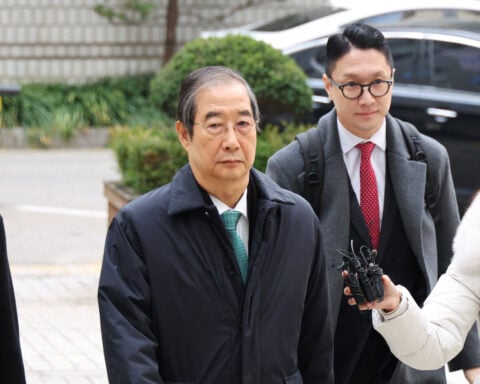 South Korea appeals court cuts jail term for ex-PM Han to 15 years in martial law case