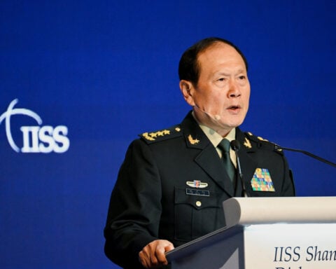 China sentences former defence ministers to death with reprieve